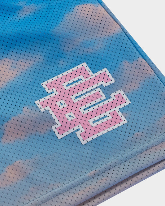 Close-up of blue and pink mens designer athletic shorts with perforated fabric and logo detail
