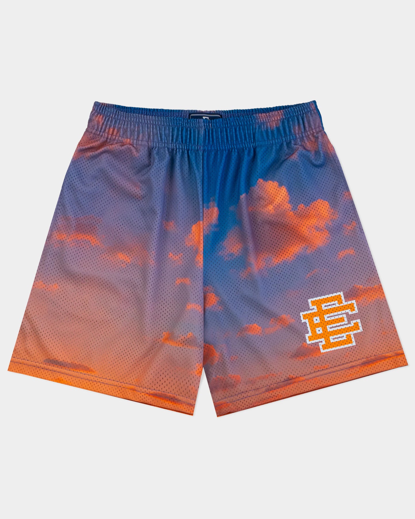 Premium designer athletic shorts with vibrant orange and blue cloud pattern and elastic waistband